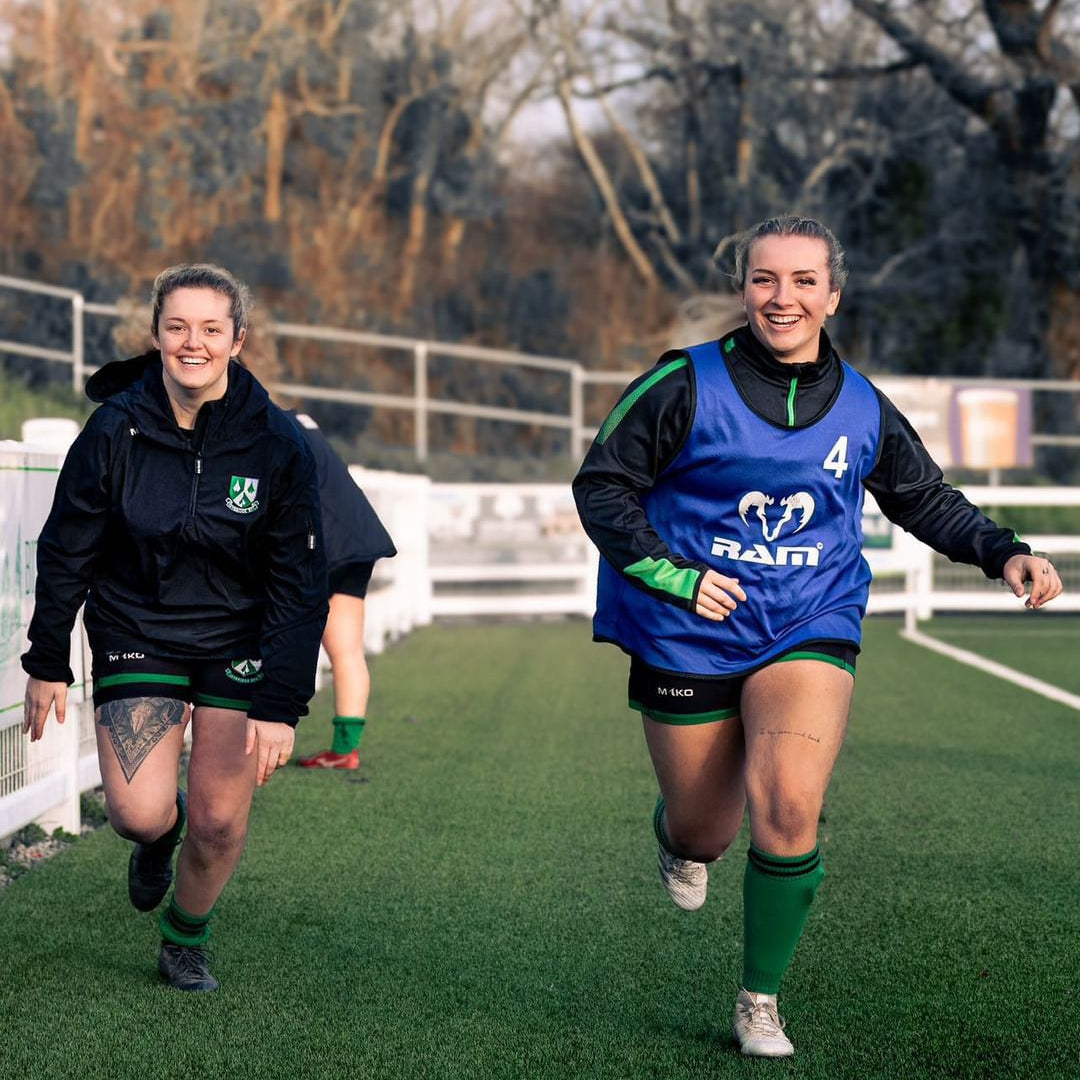 Set of 15 Ram Rugby reversible training bibs in red and yellow with large printed numbers, durable contact practice gear