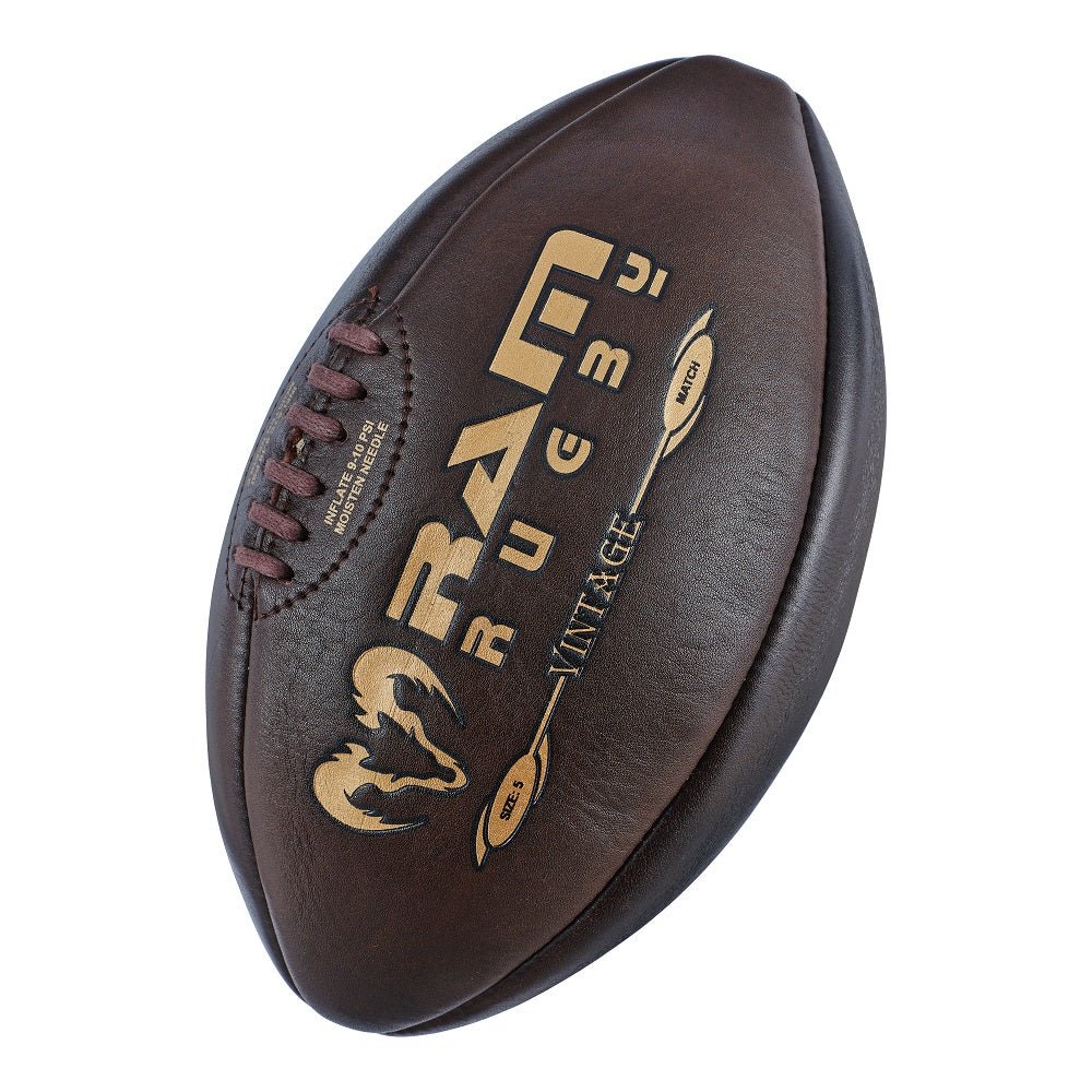 Vintage-style brown leather rugby balls stacked on grass representing the Fun Rugby Balls collection for active sports play
