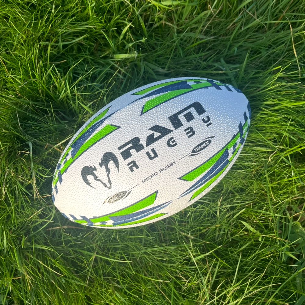 Ram Rugby Micro Rugby Trainer Ball Size 2.5 in bright orange with durable 3 ply polycotton and 3D grip, for kids ages 4-6.