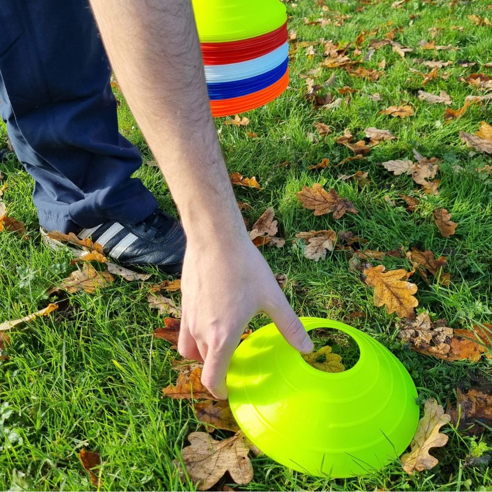 Set of 50 Ram Rugby club training marker cones in blue, red, white, fluoro yellow, and fluoro orange with storage stand