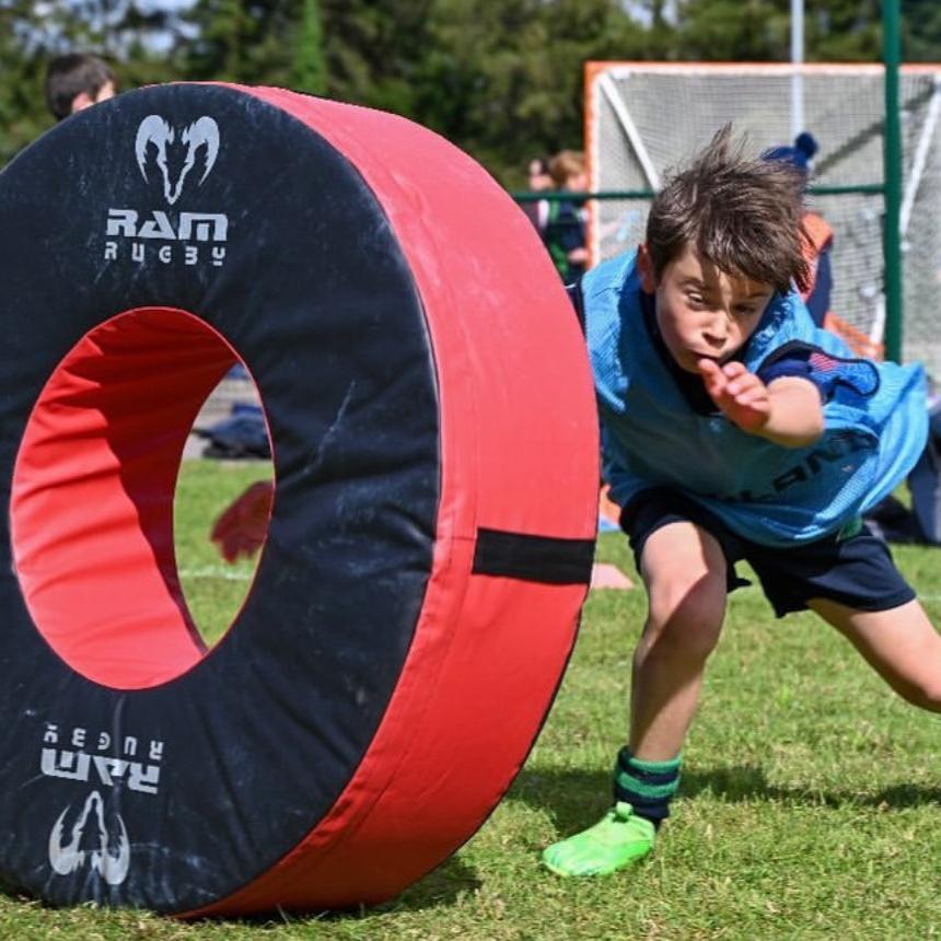 Ram Rugby Roller Tackle Bag showing durable 15KG model with sturdy blue cover and robust base for rugby training drills