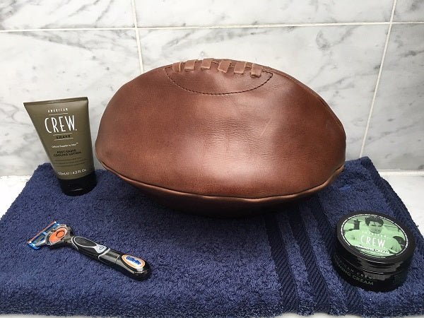 Ram Rugby brown vintage leather wash bag with hand-stitched rugby ball design, durable travel toiletry organizer